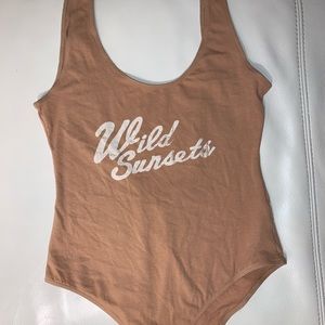 Tan, low back body suit (pacsun)